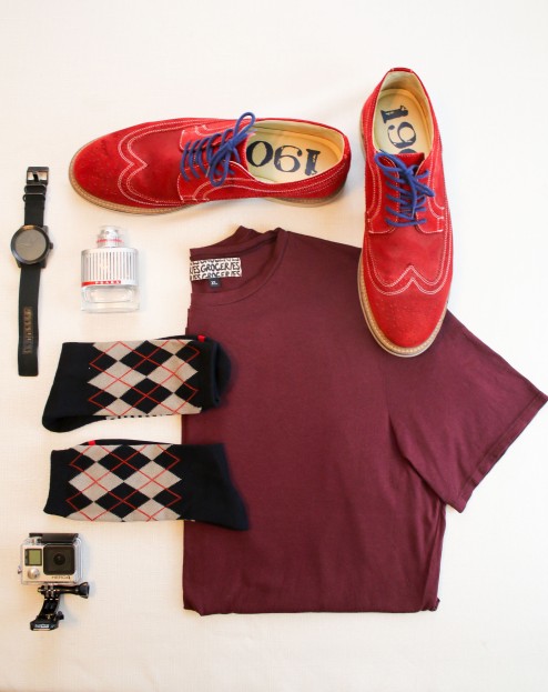 (From Left to Right: Nixon Canvas, 1902 wing tipped men's shoes, Prada cologne, Locally Made Tee. Active socks, GoPro)